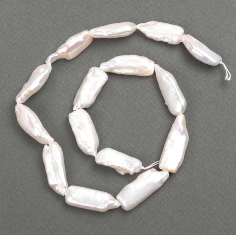 Barokowe perły z odcieniem benzynowym o średnicy 26-32×10-11 mm, długość 39 cm