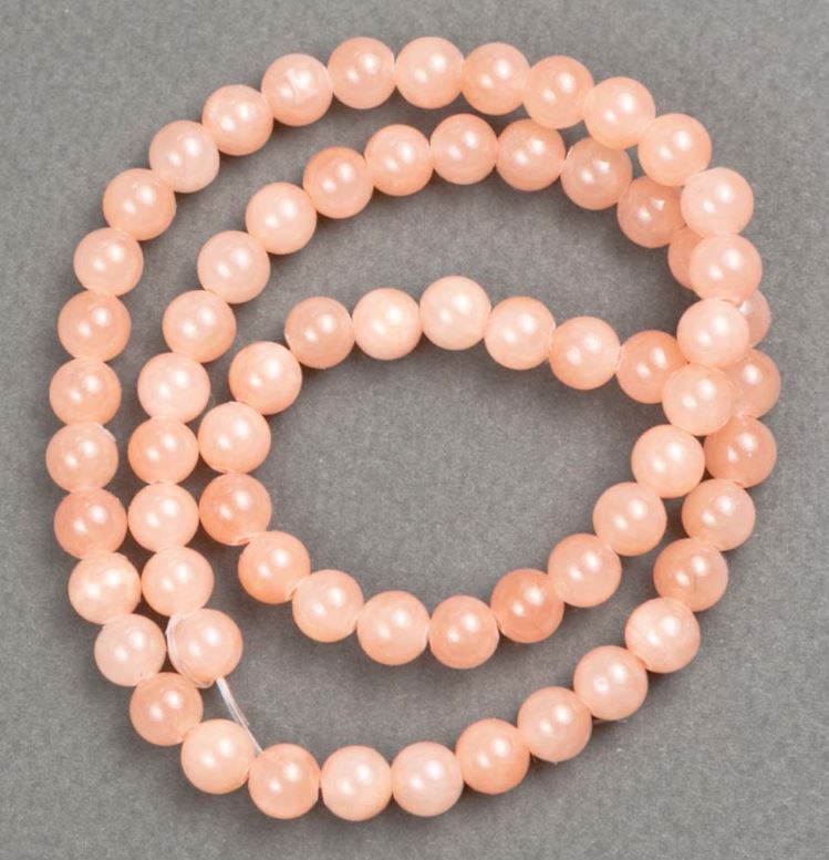 Koraliki na żyłce z selenitu (sztuczny akryl) gładkie kulki 6 mm +- długość 40 cm