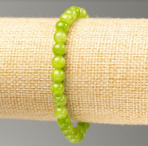 Bransoletka na gumce z imitacją onyksu (sztuczny akryl), średnica 6,5 mm, długość 18 cm