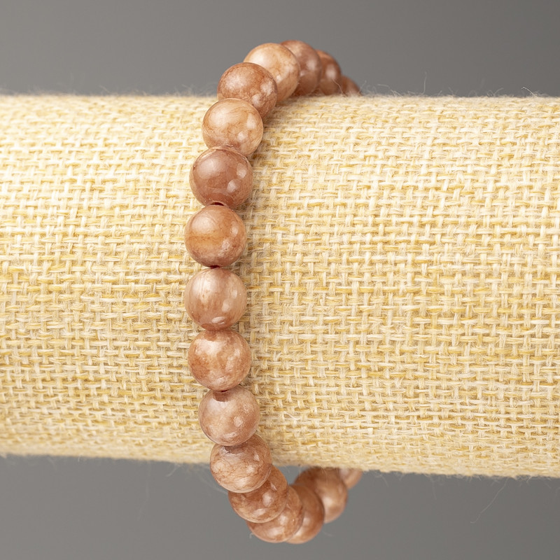 Bransoletka z selenitu ze sztucznego akrylu, średnica ok. 8 mm, długość ok. 18 cm, gładka kulka na elastycznej gumce