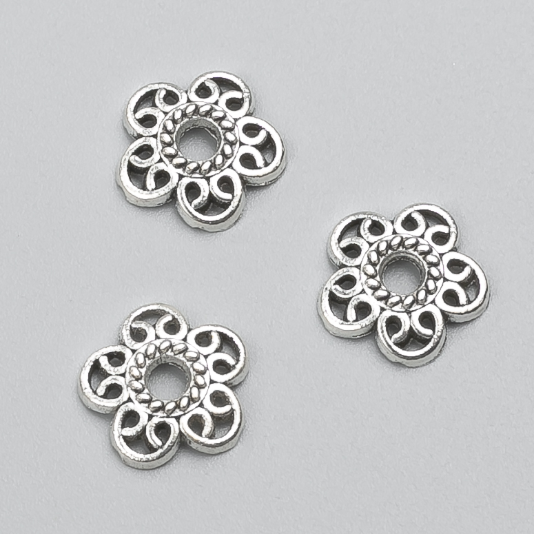 Końcówka jubilerska w kolorze srebrnym, średnica 12×2 mm (±), opakowanie 20 g, 52 szt. (±)