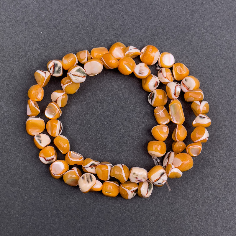 Koraliki tonowane pomarańczowe w kształcie soczewki, średnica 8×6 mm, długość 41 cm na żyłce