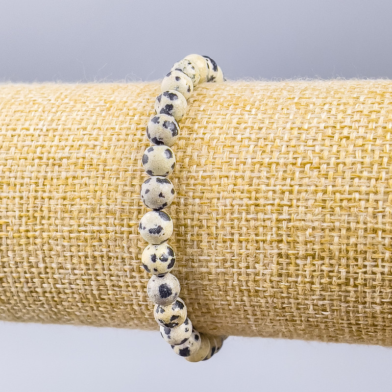 Bransoletka z jaspisu dalmatyńskiego (sztuczny akryl) gładka kulka, średnica 6 mm, długość 18 cm (elastyczna)