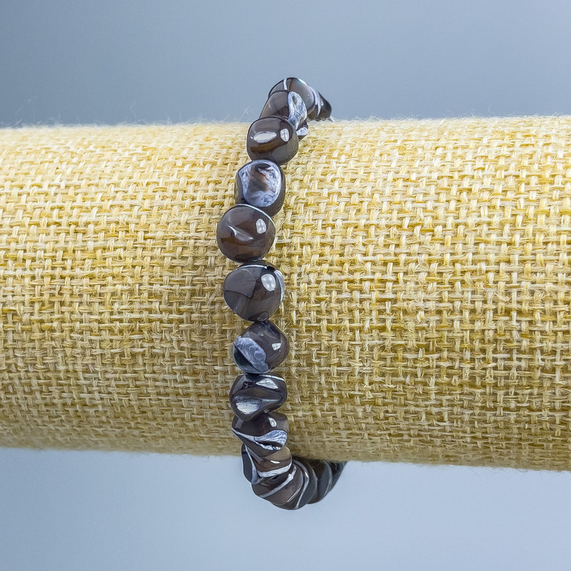 Bransoletka z brązowej masy perłowej, fasetowana, o średnicy 8×6 mm, długość 18 cm (rozciągliwa)