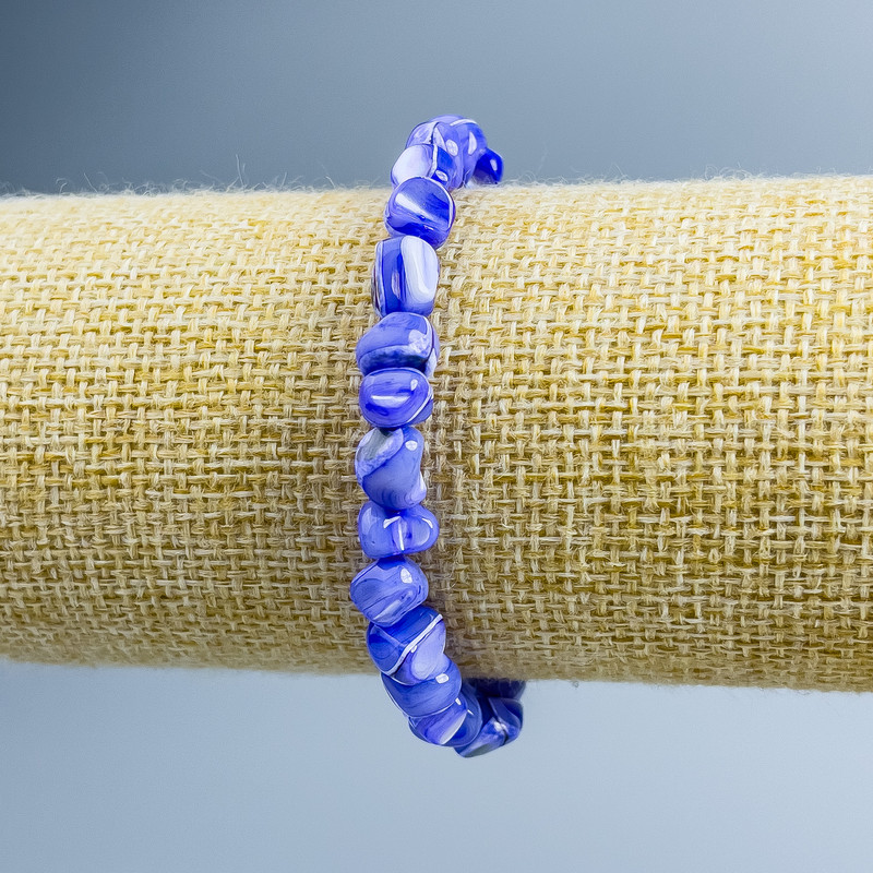 Bransoletka z fioletowej masy perłowej fasetowana, średnica 8×6 mm, długość 18 cm (rozciągliwa)