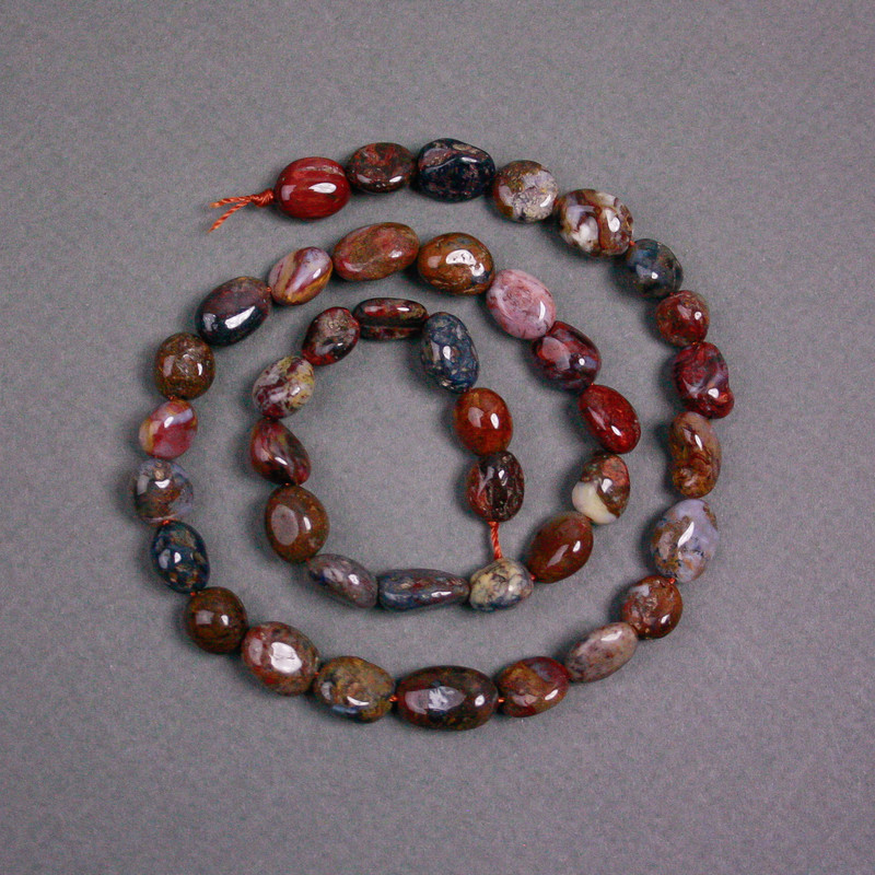 Koraliki pietersytu na nitce naturalne 7×10 mm fasetowane, długość ok. 38 cm